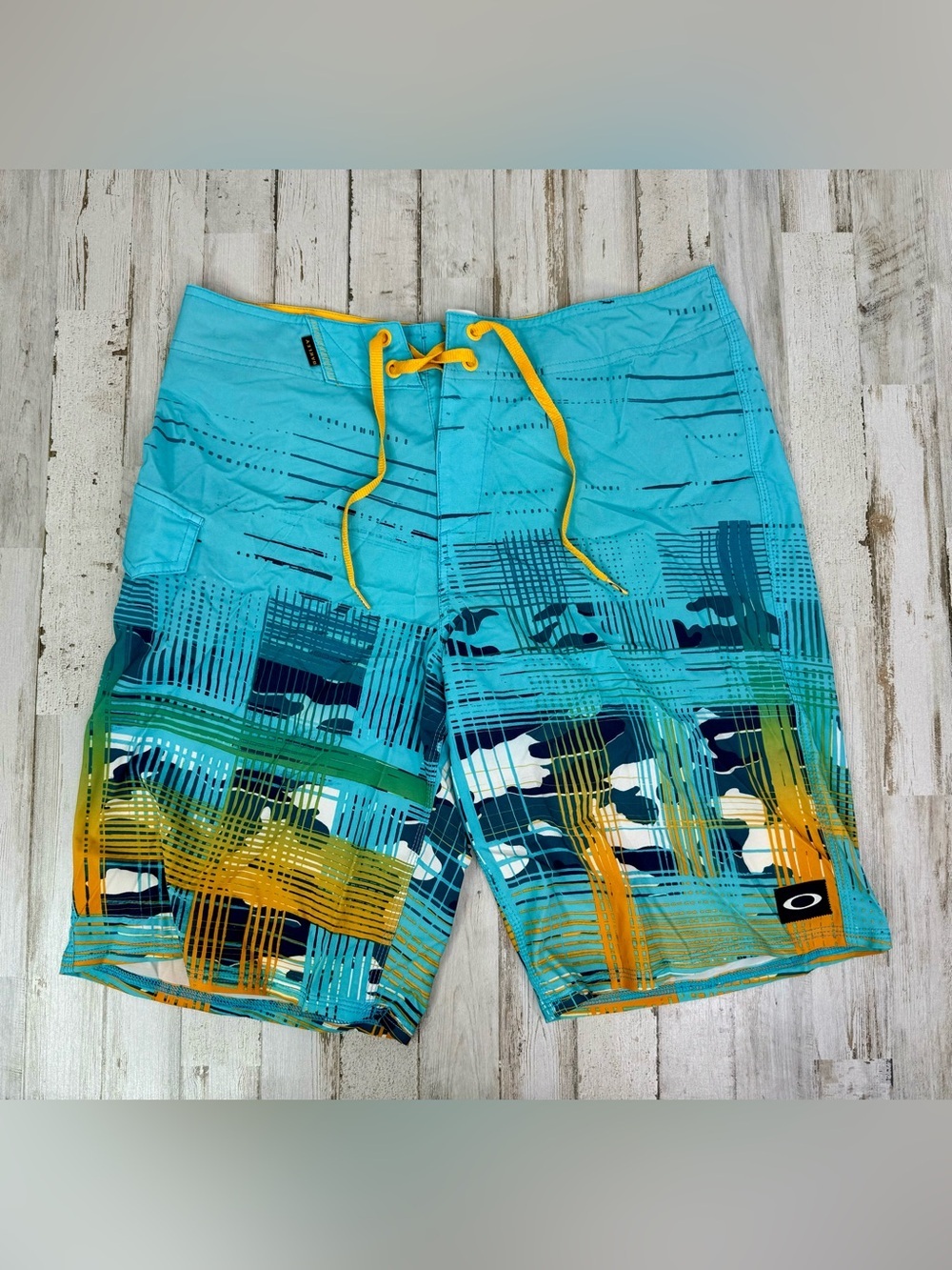 Oakley Swim Trunks Shorts Mens 32 Blue 10" inseam geometric